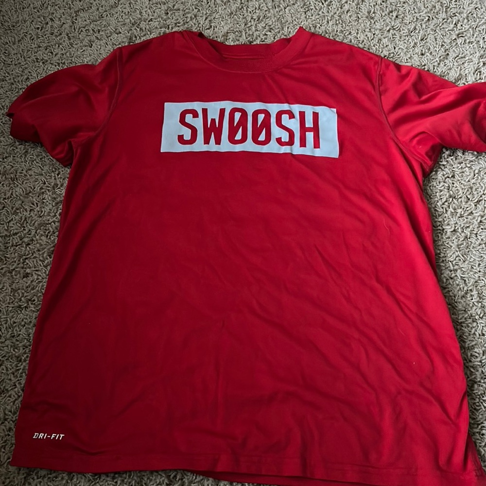 Nike Swoosh Dri fit red shirt.